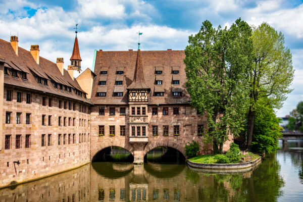 Hospice of the Holy Spirit, Heilig-Geist-Spital and Pegnitz river in Nuremberg, Germany