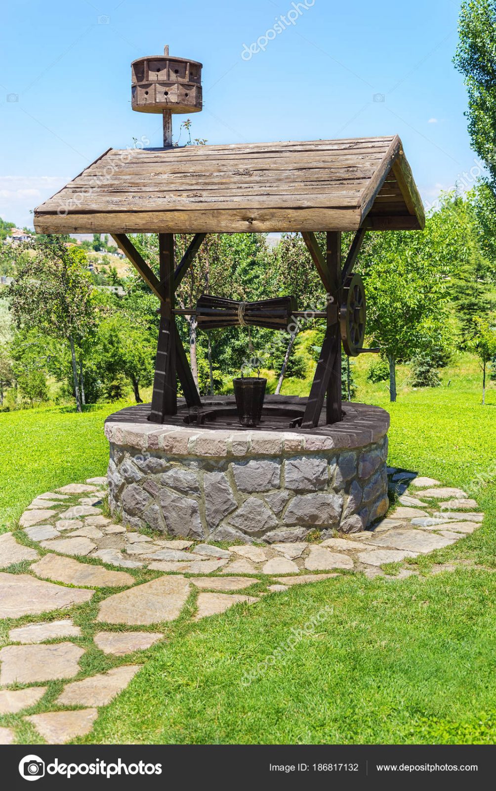 Old artesian Water Well With Pulley and Bucket