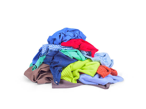 heap of colorful clothes, isolated on white background